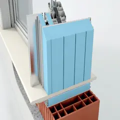 Sezione di un serramento con cappotto isolante blu, davanzale e mattoni. Le spallette delle finestre sono ben visibili.