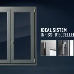 Finestra grigia a doppio battente, con dettagli maniglie e cerniere. Scopri il bonus finestre come funziona con Ideal Sistem.